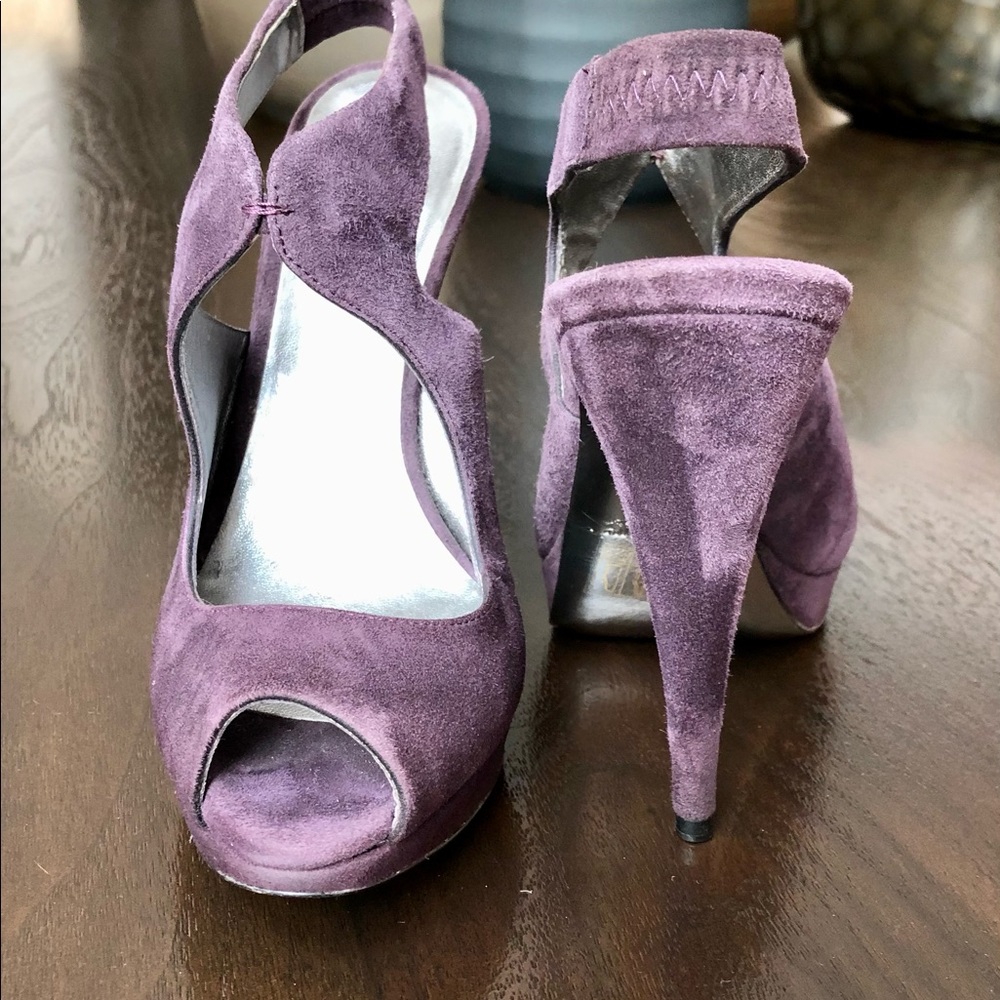 Size 6 1/2 Miu Miu in a Rich Purple Suede.